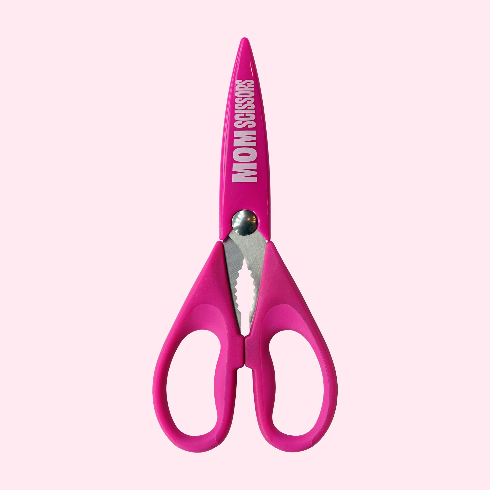 Pink Mom Scissors with protective sheath on the scissors.